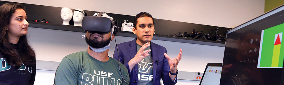 A student using a virtual reality headset in class.
