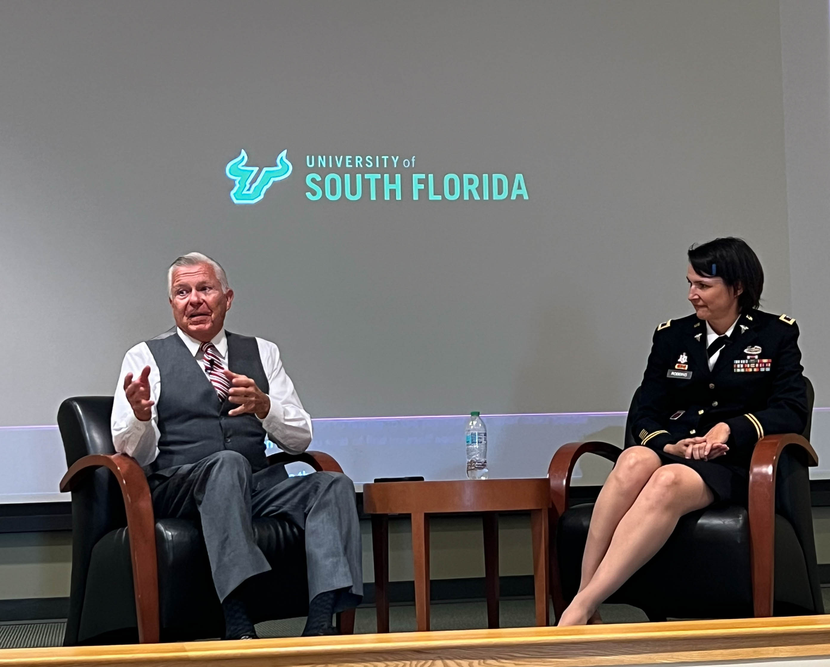 Bob Delaney presenting during a custom tailored event by USF CTPE