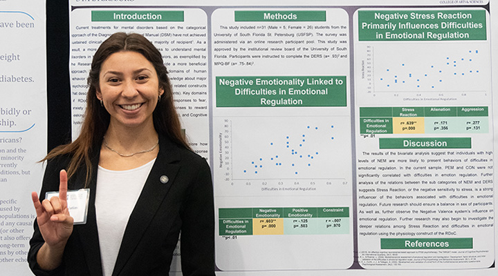 girl in front of poster