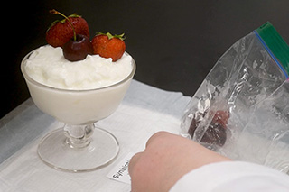 Cup of yogurt with strawberries